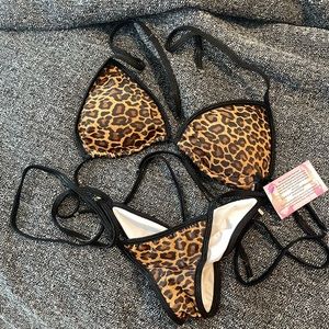 ACBikini Posing Suit. Never Worn. Includes breast Enhancers.